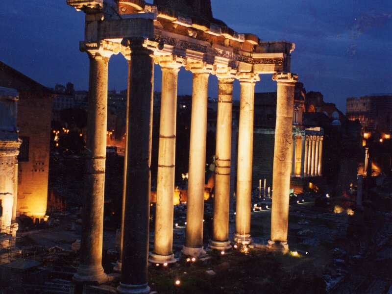 ancient roman columns at dusk