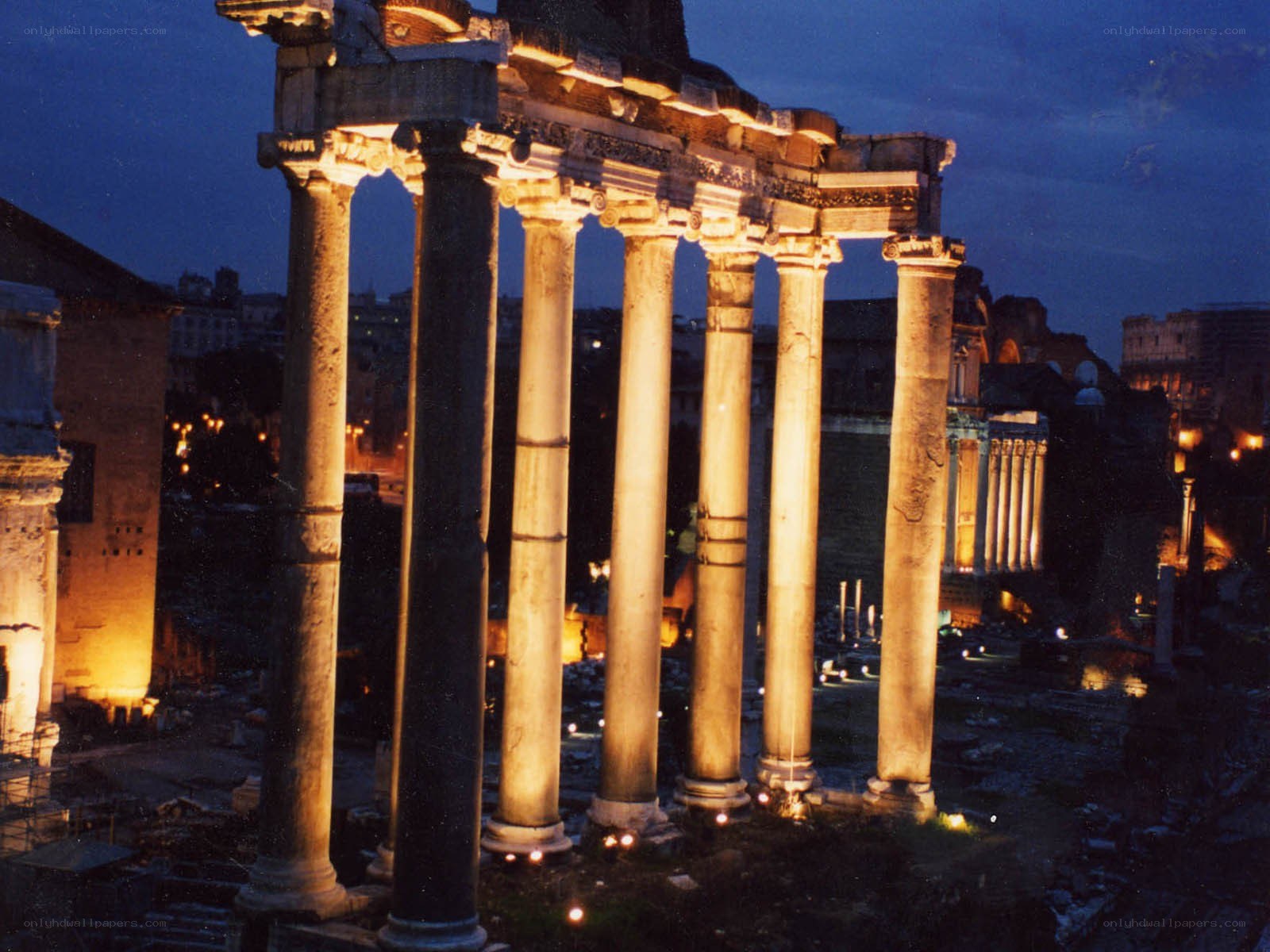 ancient roman columns at dusk