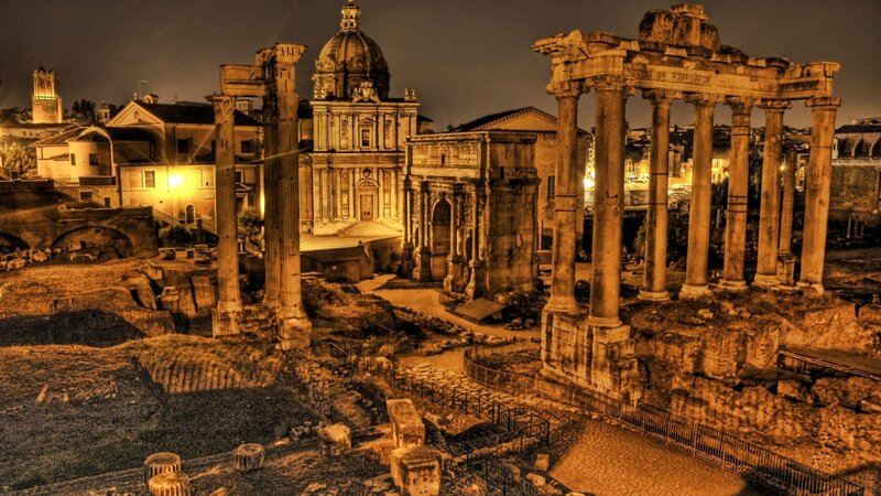 Ancient Roman ruins at night