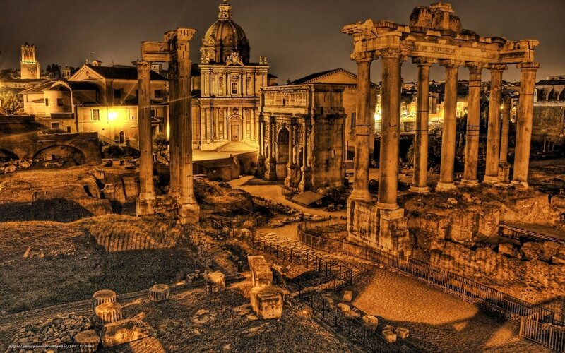 Ancient Roman ruins at night