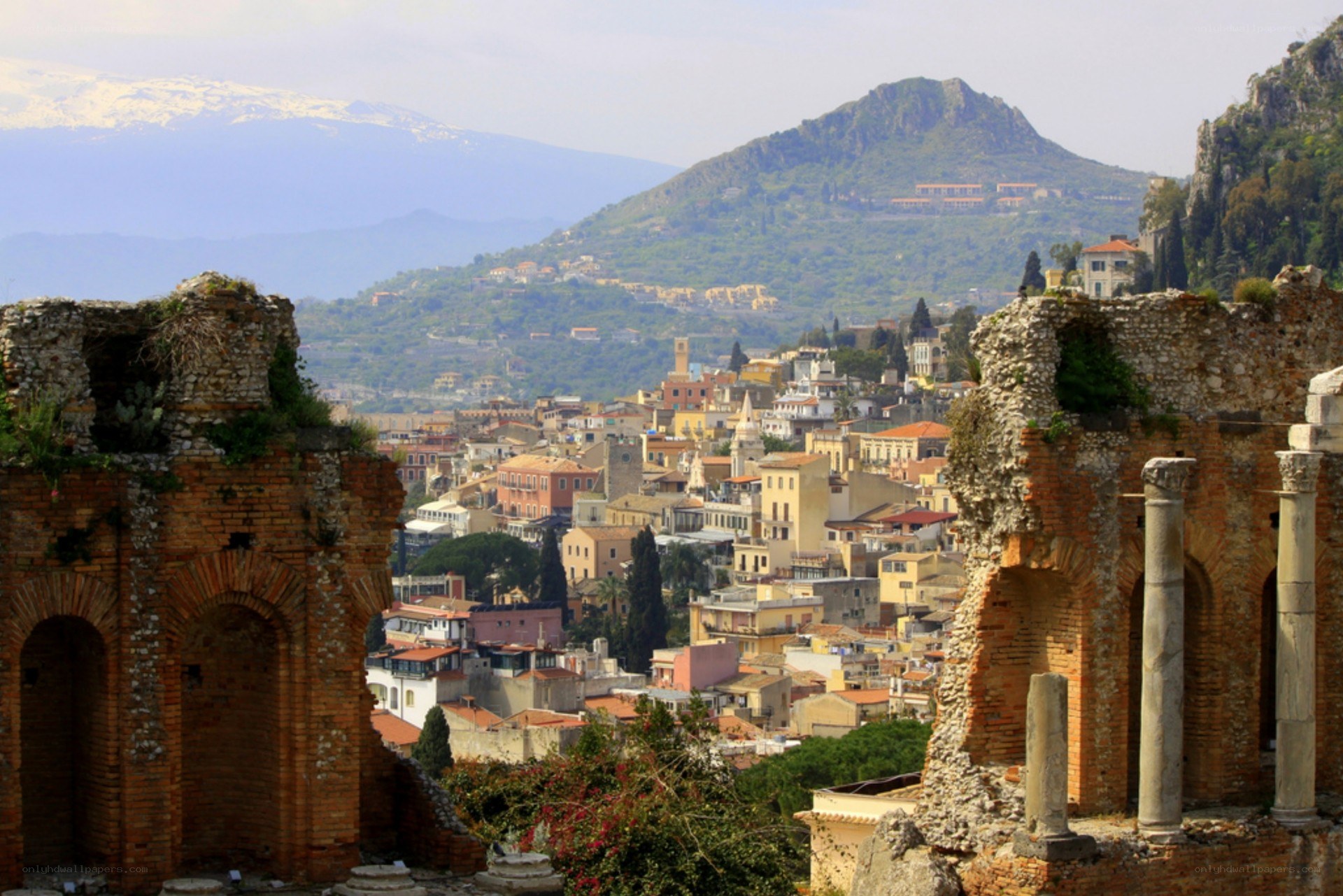ancient ruins overlooking a city