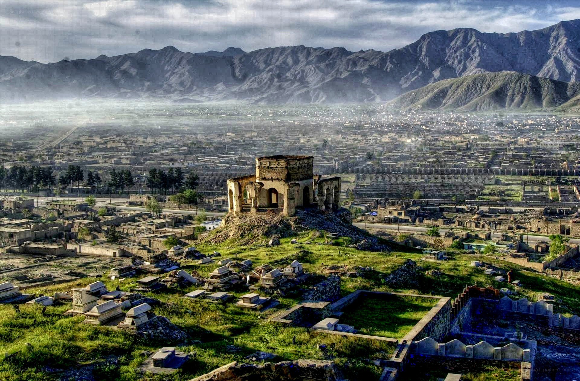 ancient ruins overlooking a valley
