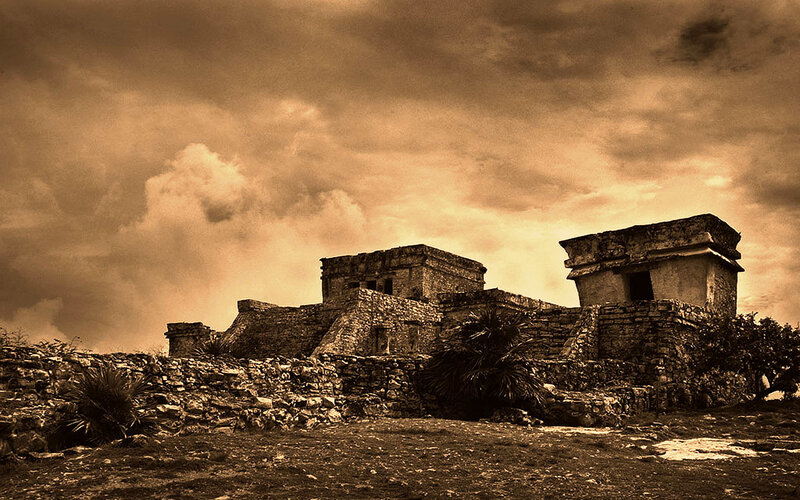 ancient ruins under cloudy sky
