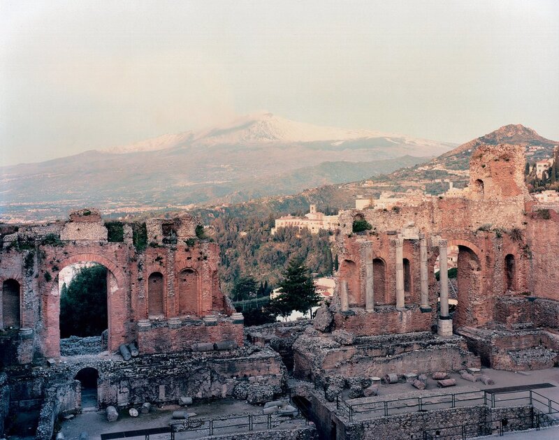 Ancient ruins with Mount Etna