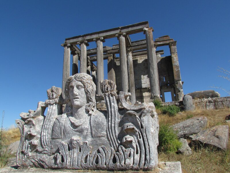 Ancient ruins with statue