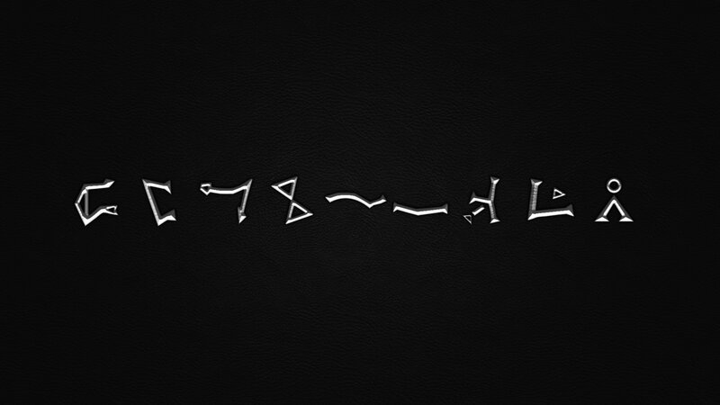 ancient script on black leather