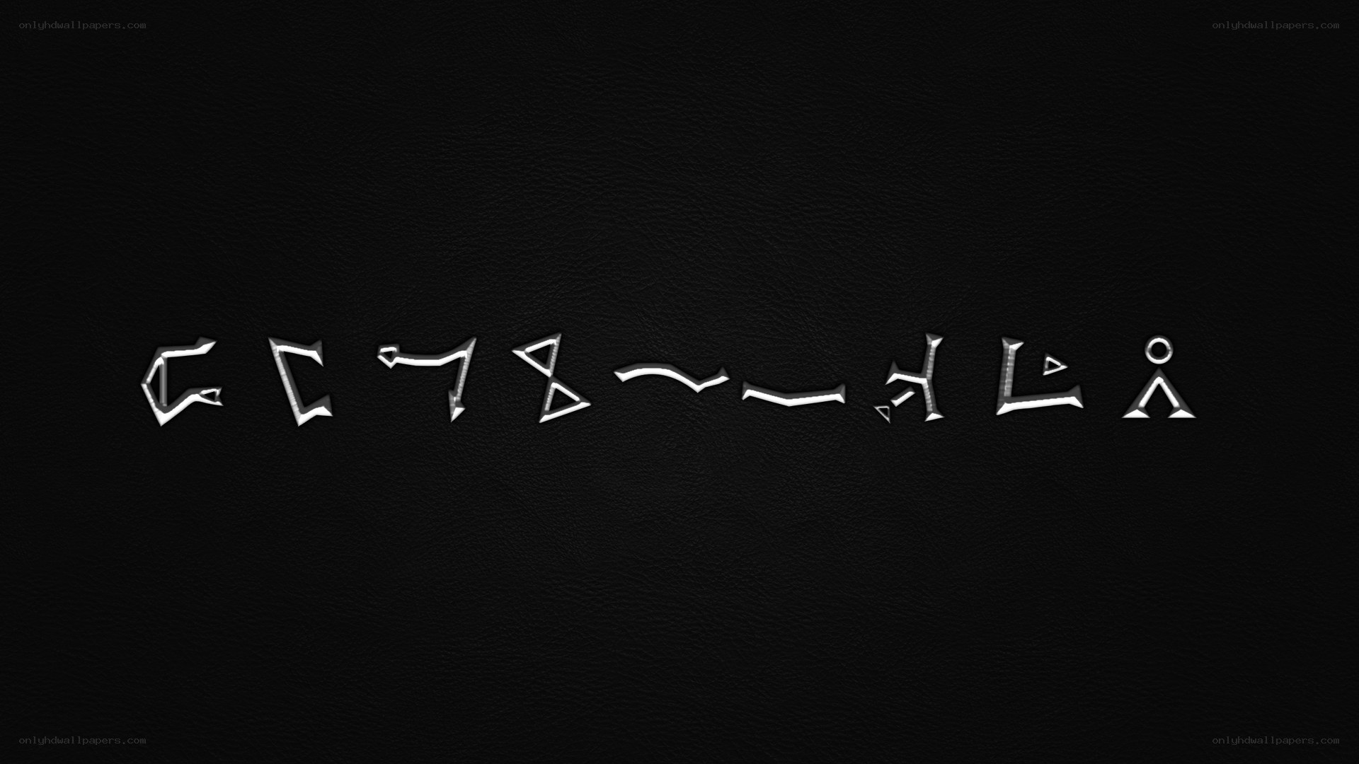 ancient script on black leather