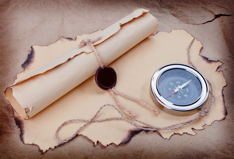 ancient scroll and compass