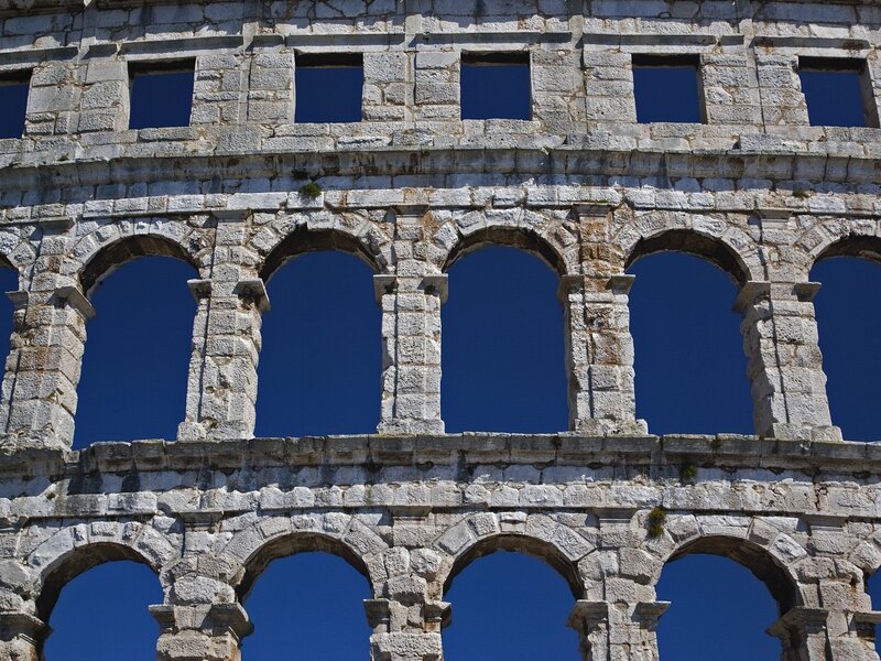 Ancient stone amphitheater facade