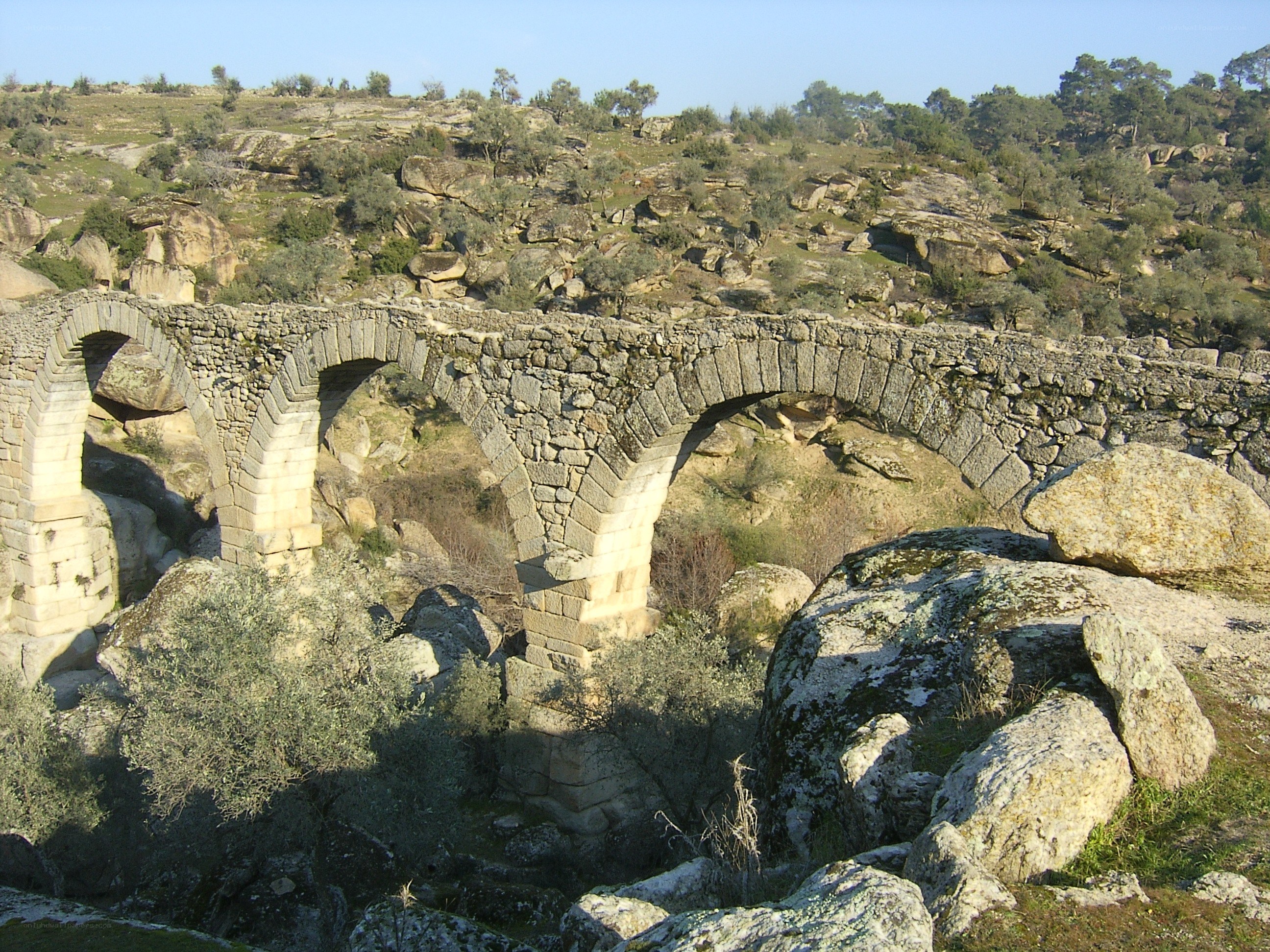 Ancient stone aqueduct bridge