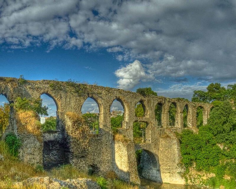 Ancient stone aqueduct ruins