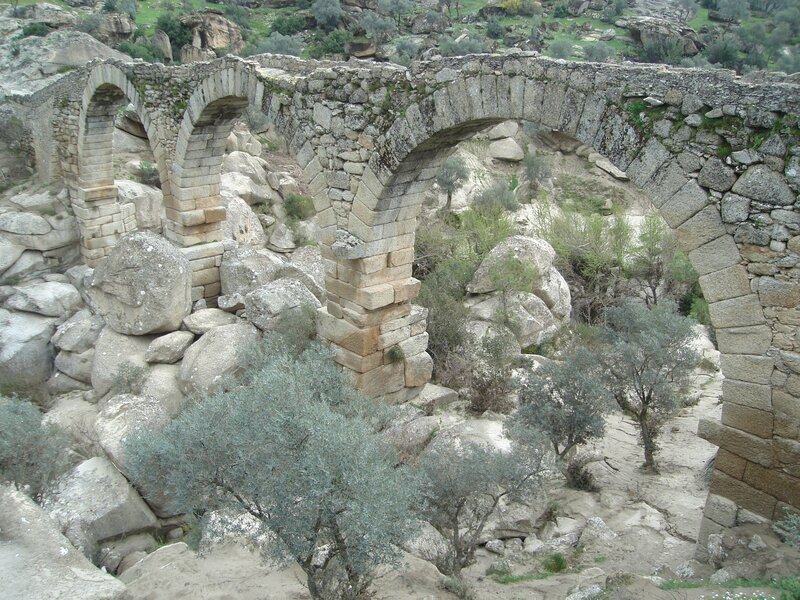 Ancient stone aqueduct ruins