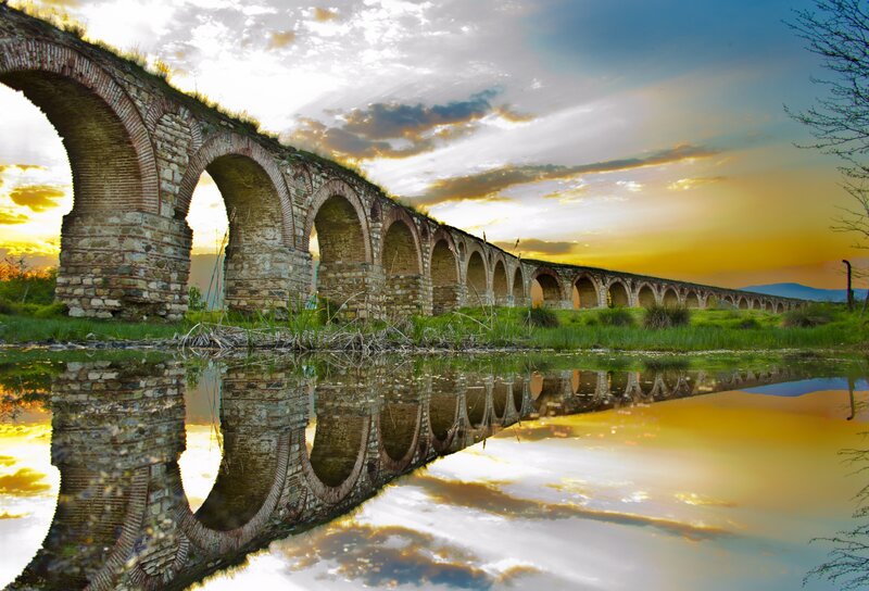 Ancient Stone Aqueduct — Yellow, Serene