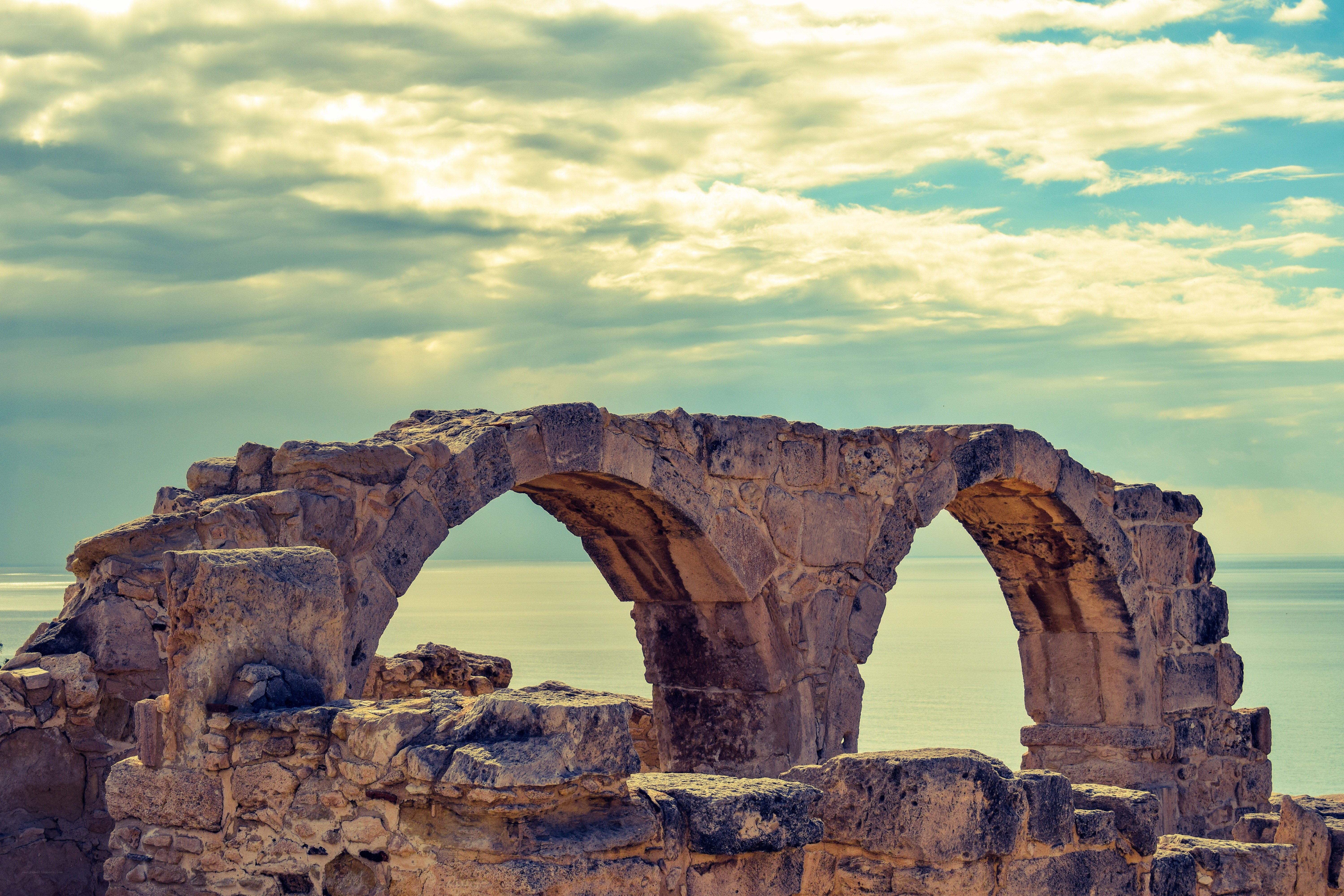 Ancient stone arches by the sea