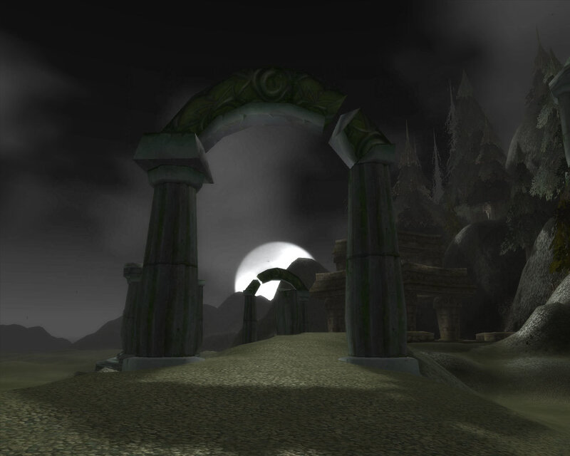 ancient stone archway at night