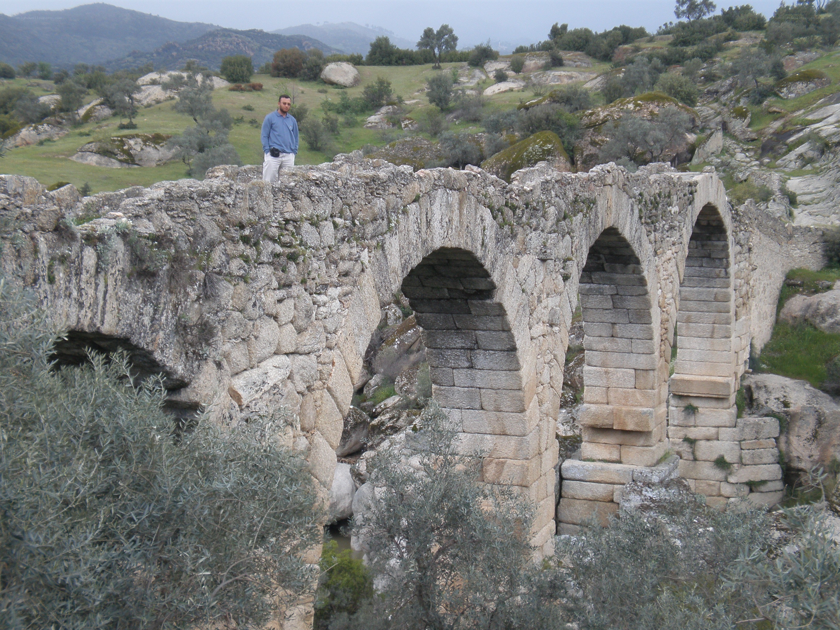 Ancient stone bridge in a valley
