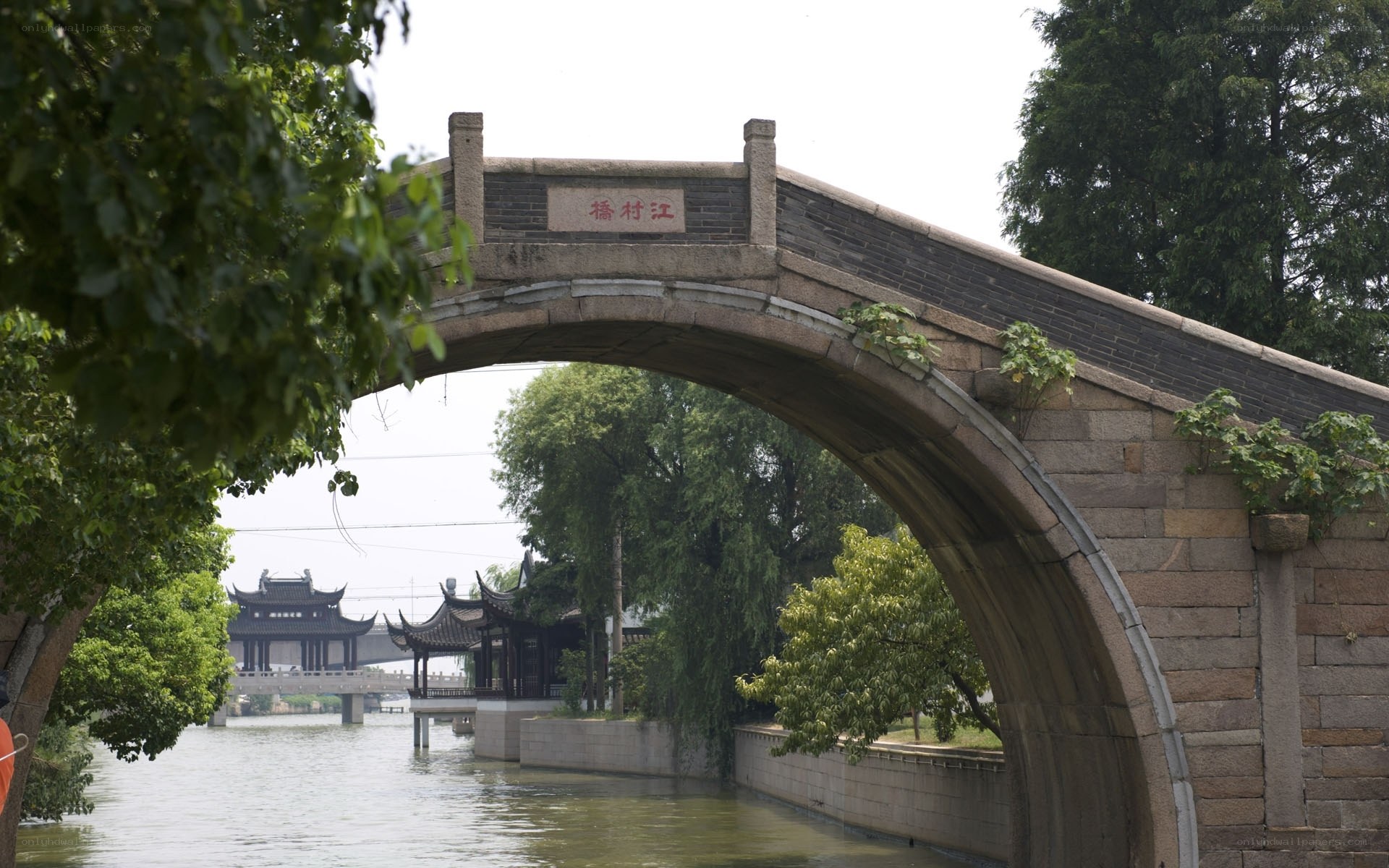ancient stone bridge over canal