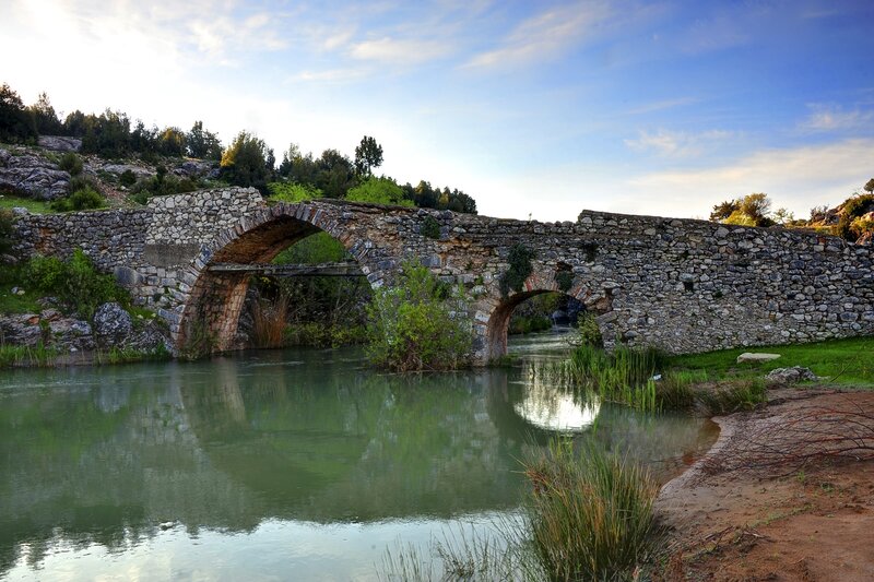 Ancient stone bridge over river