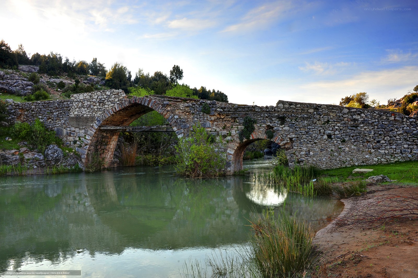Ancient stone bridge over river