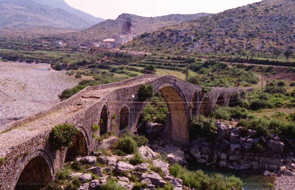 Ancient stone bridge over river