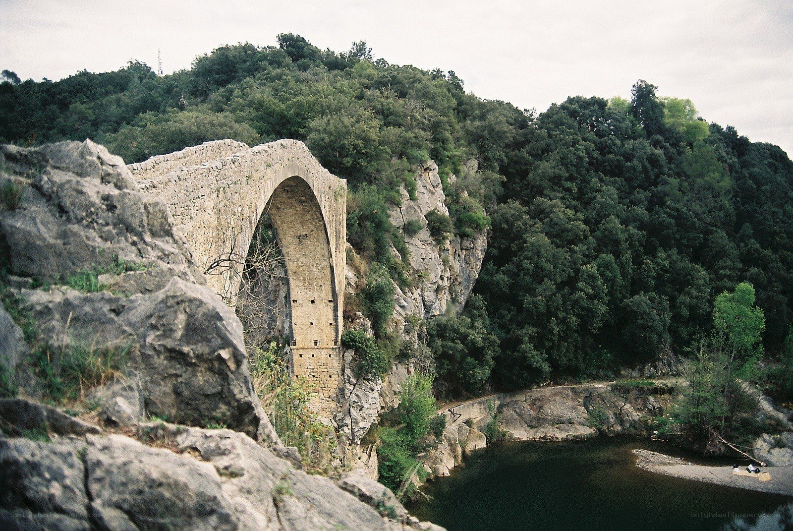 Ancient stone bridge over river