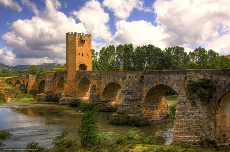 Ancient stone bridge with tower