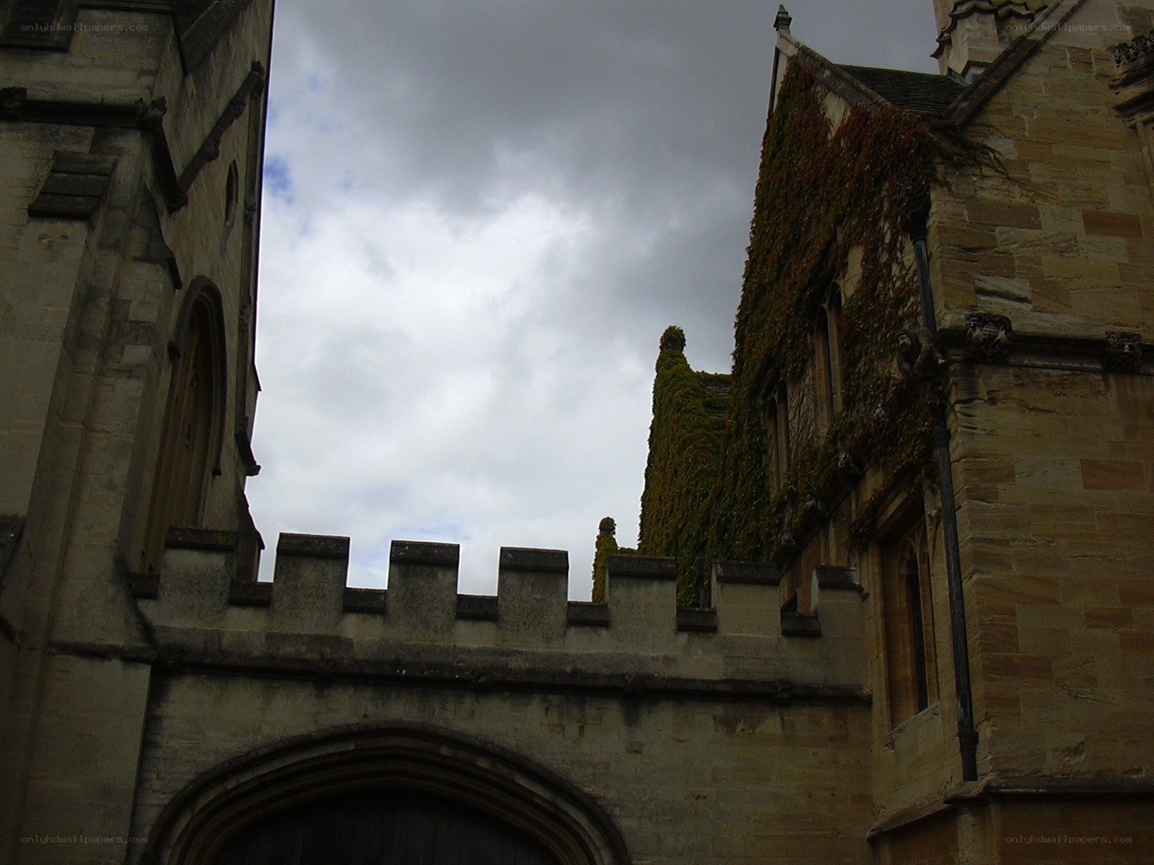 ancient stone buildings under cloudy sky