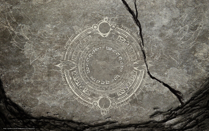 ancient stone carving with runes