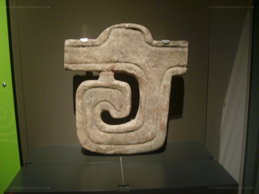 Ancient stone carving with spiral design