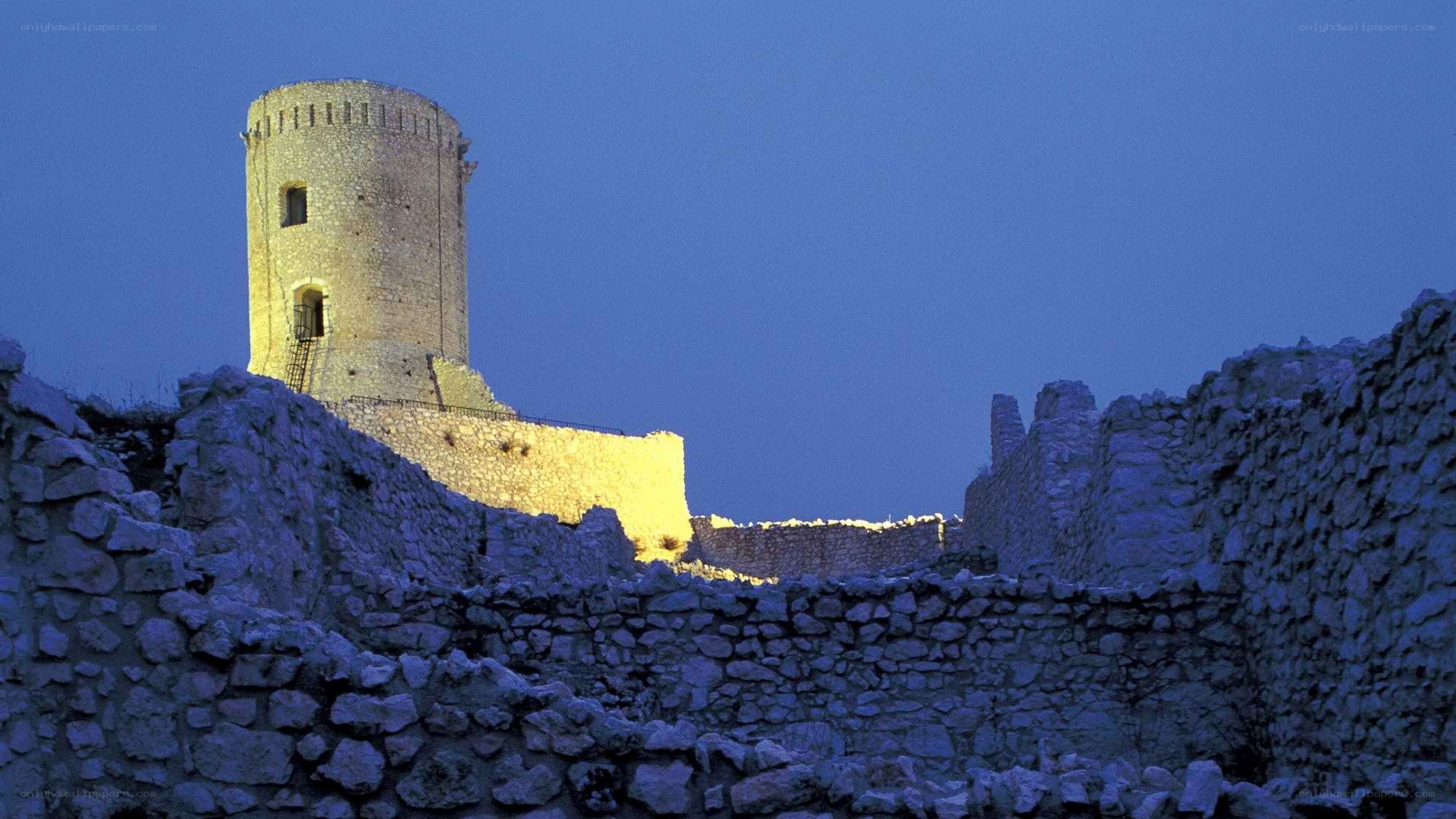 ancient stone castle at dusk