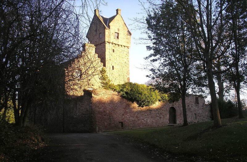 ancient stone castle in trees