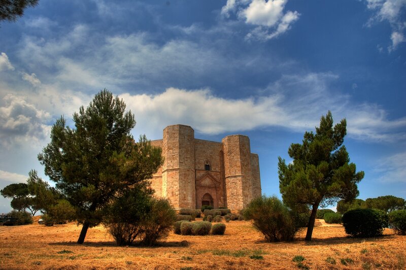 Ancient stone castle under blue sky