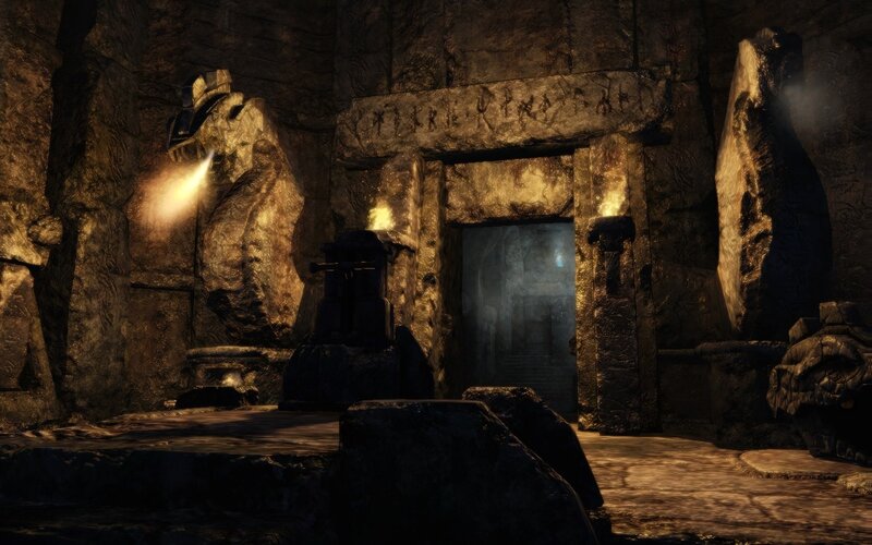 ancient stone chamber with statues