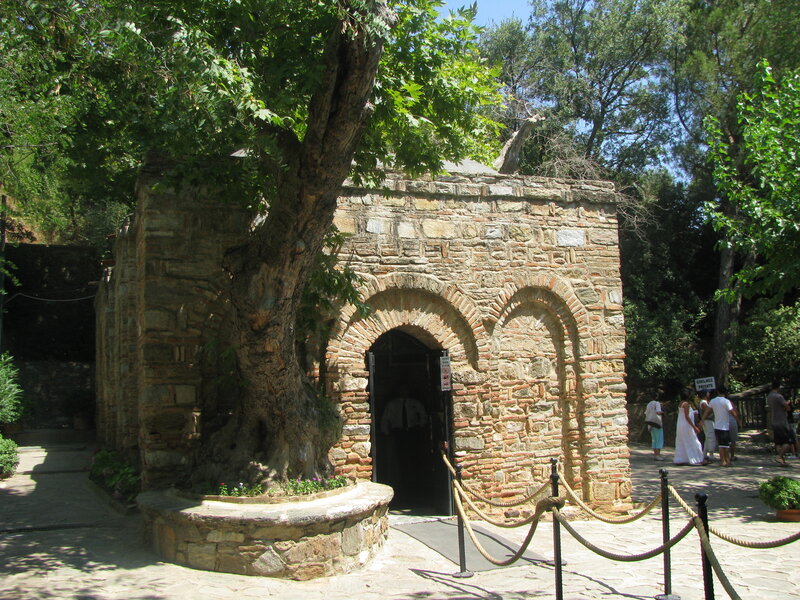 ancient stone chapel with tree