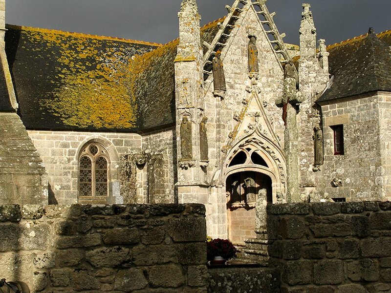 ancient stone church with mossy roof
