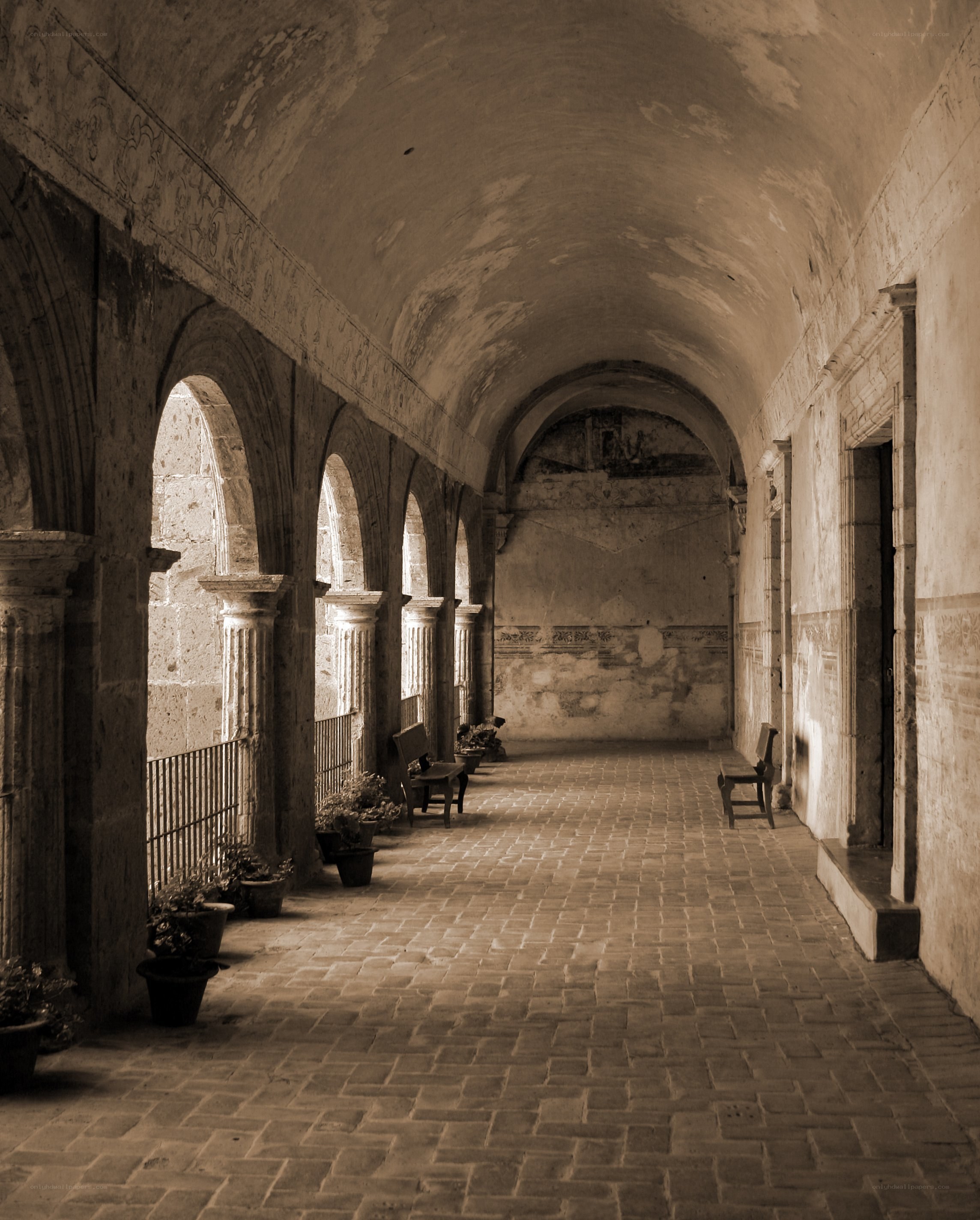 ancient stone cloister corridor