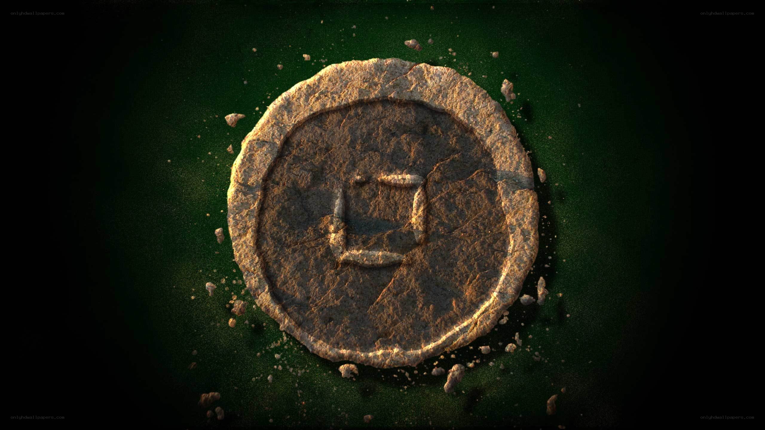 ancient stone coin with symbol