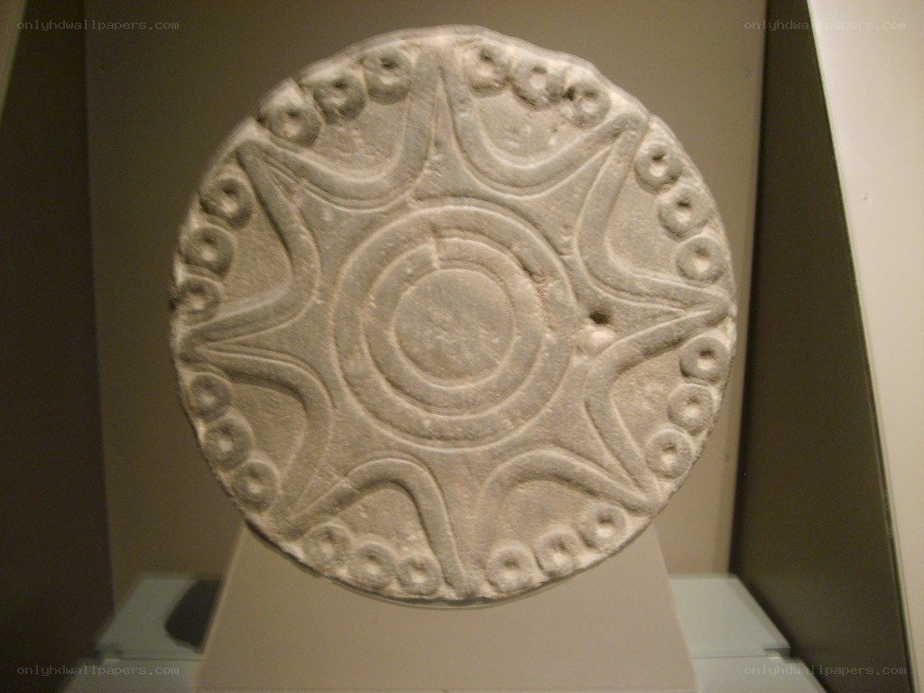 ancient stone disc artifact