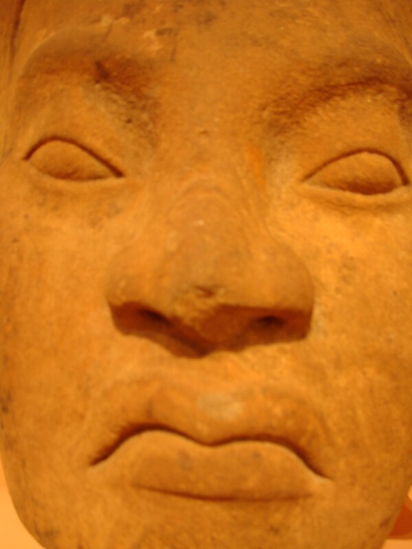 ancient stone face sculpture