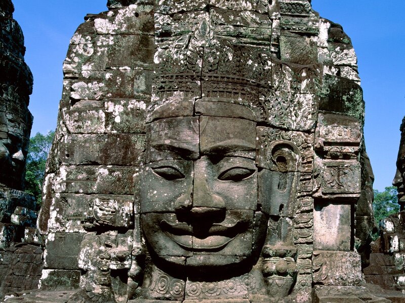 Ancient stone face sculpture