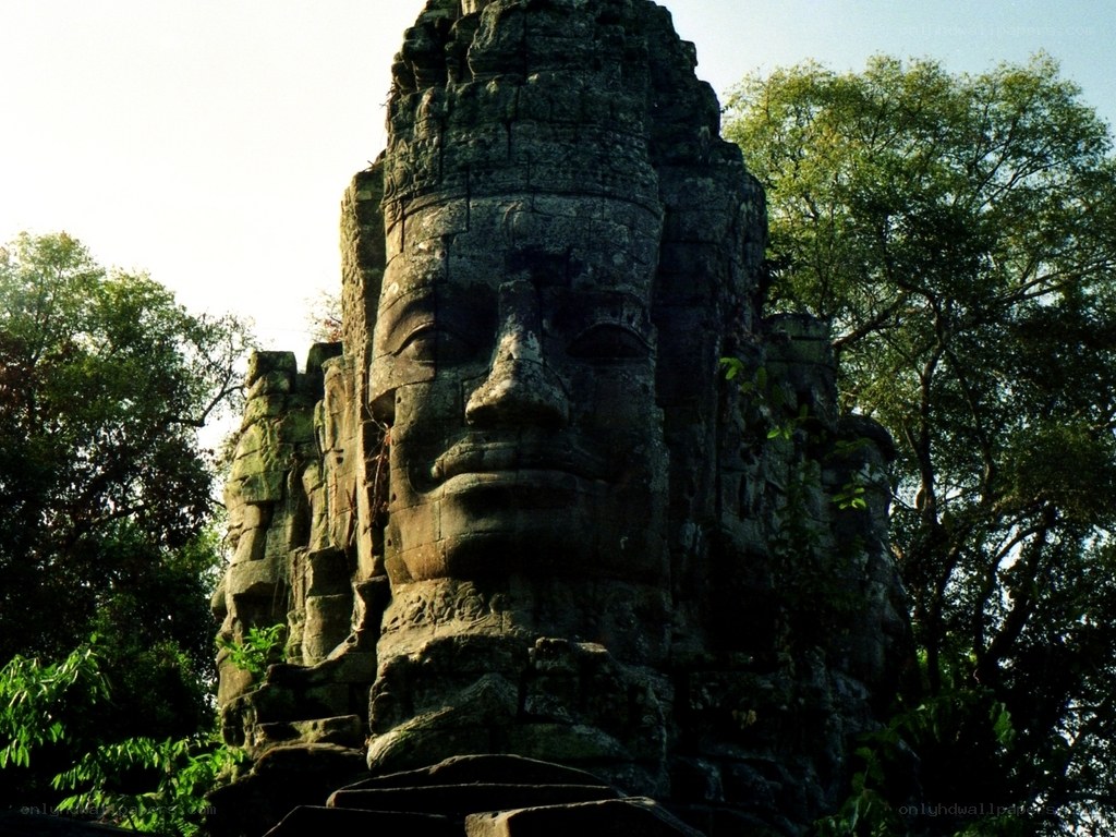 Ancient stone face sculpture