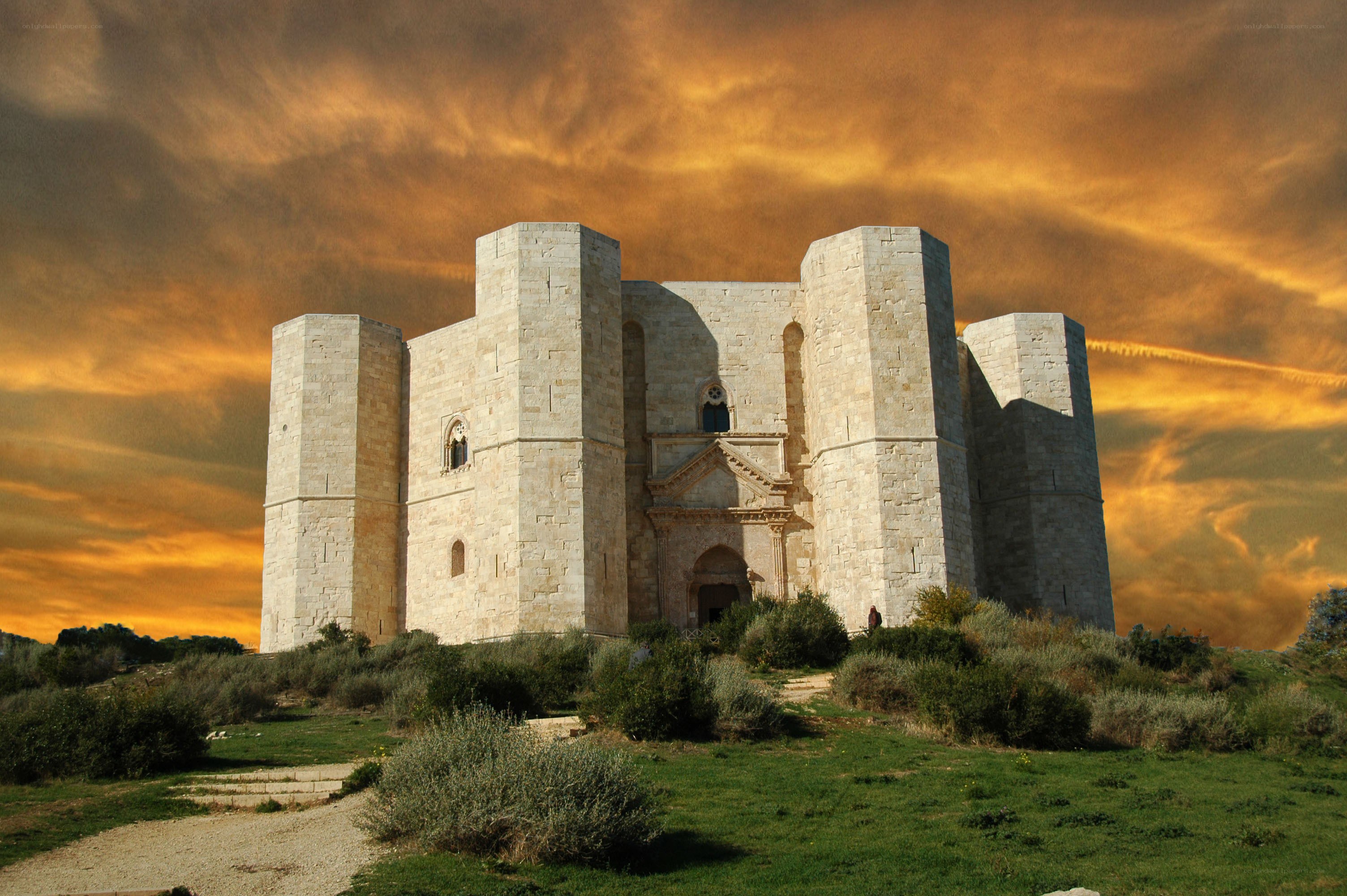ancient stone fortress at sunset