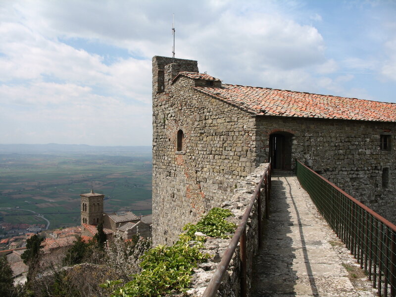 Ancient stone fortress with red-tiled roof