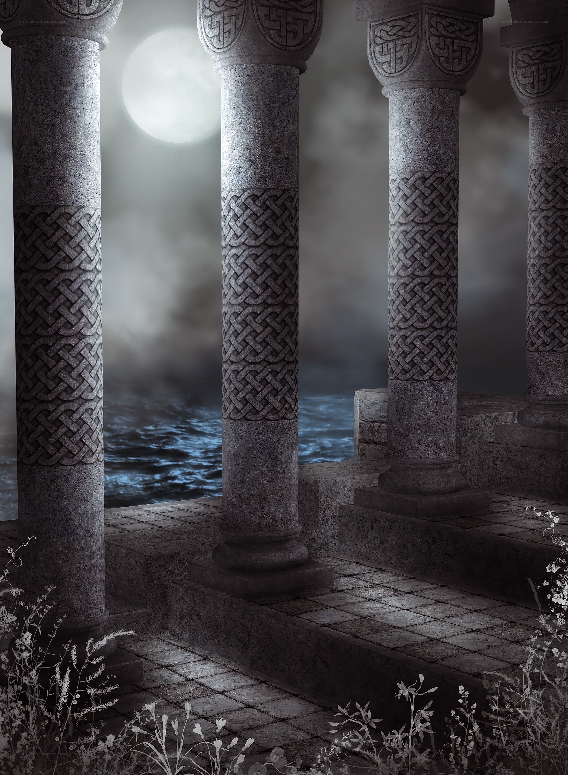 ancient stone pillars by the sea
