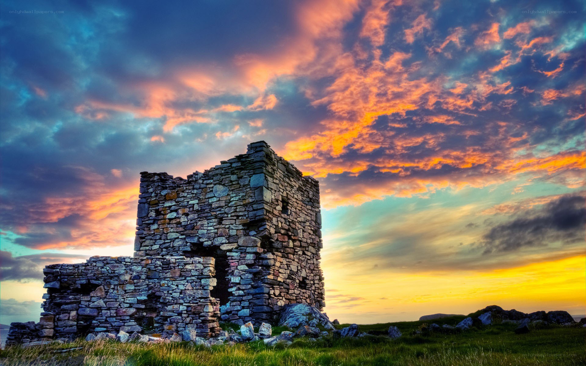 Ancient stone ruin at sunset