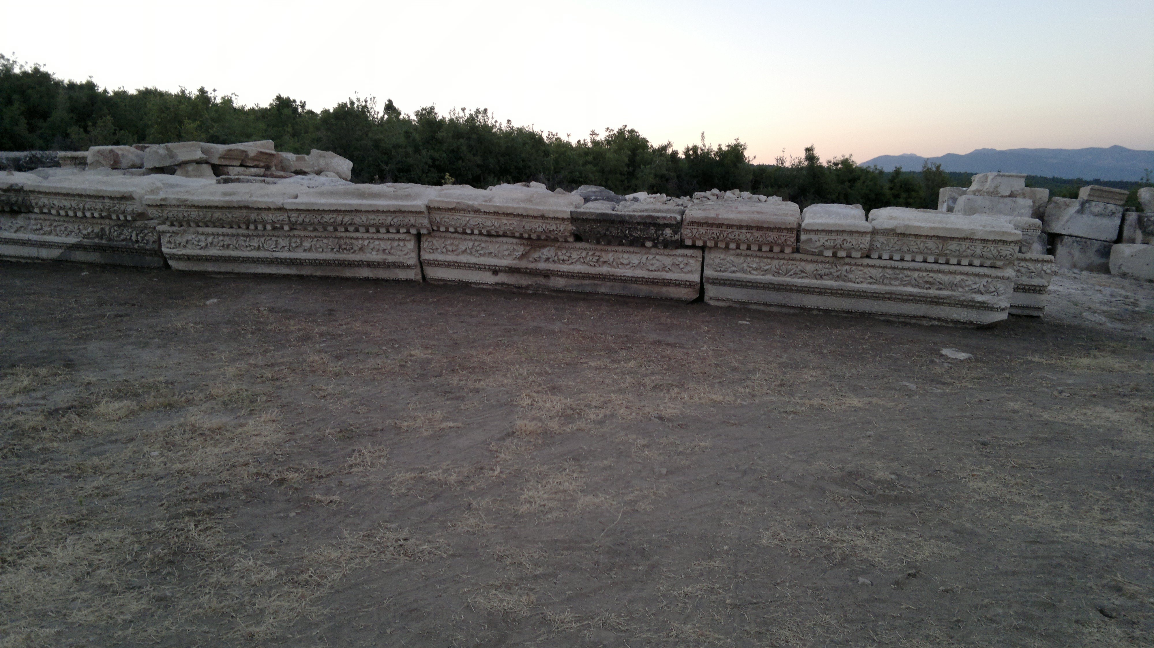 ancient stone ruins at dusk