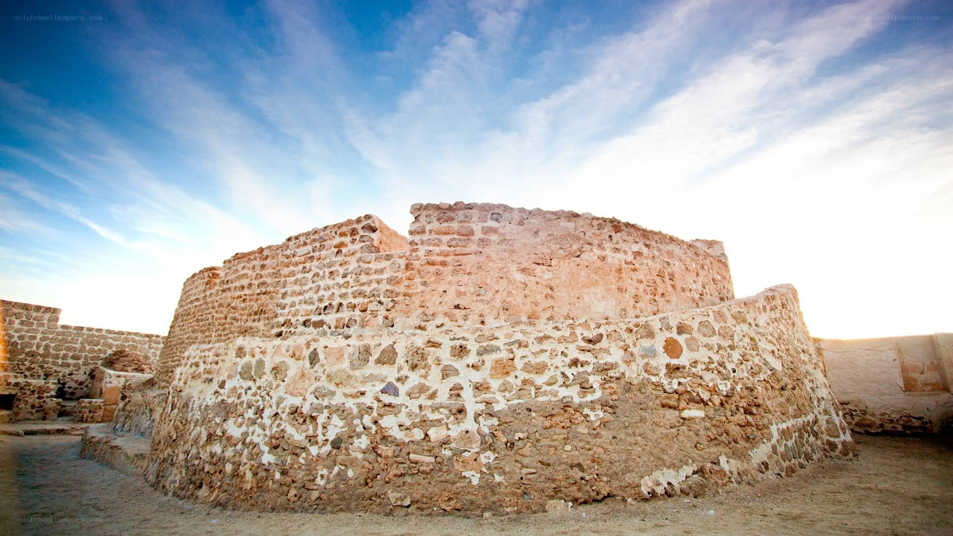 ancient stone ruins under blue sky