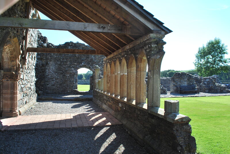 ancient stone ruins with arched walkway