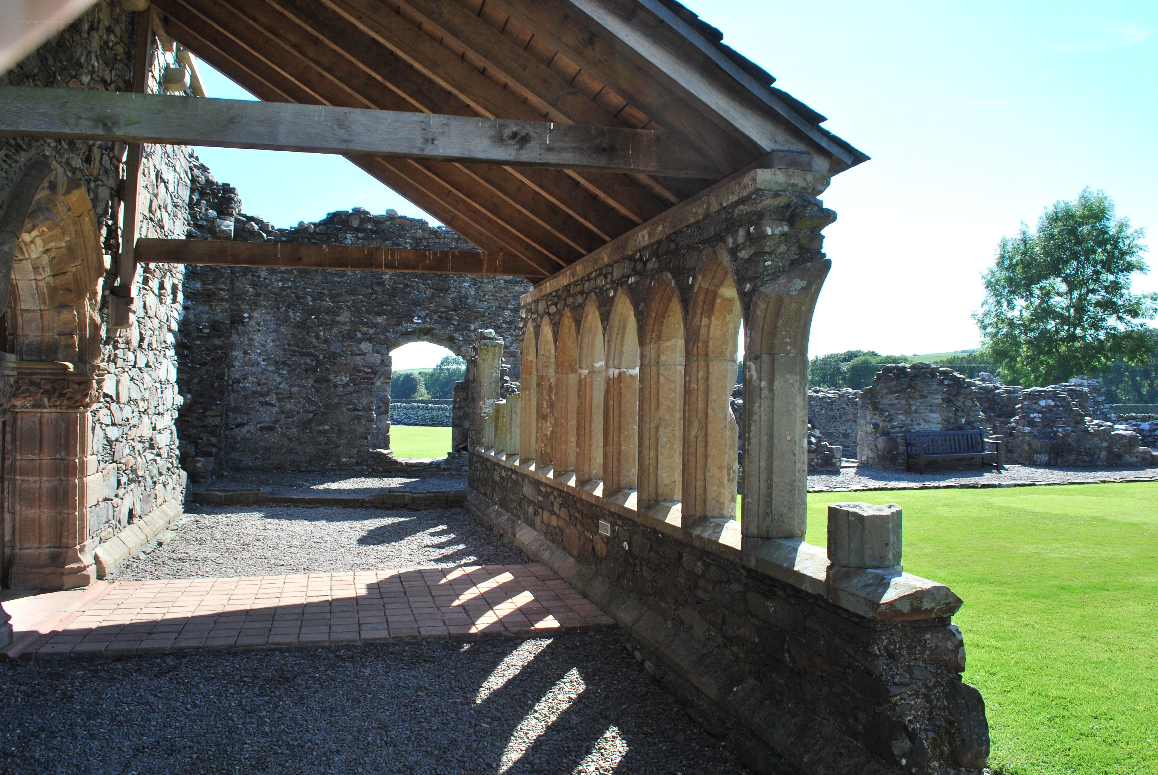 ancient stone ruins with arched walkway