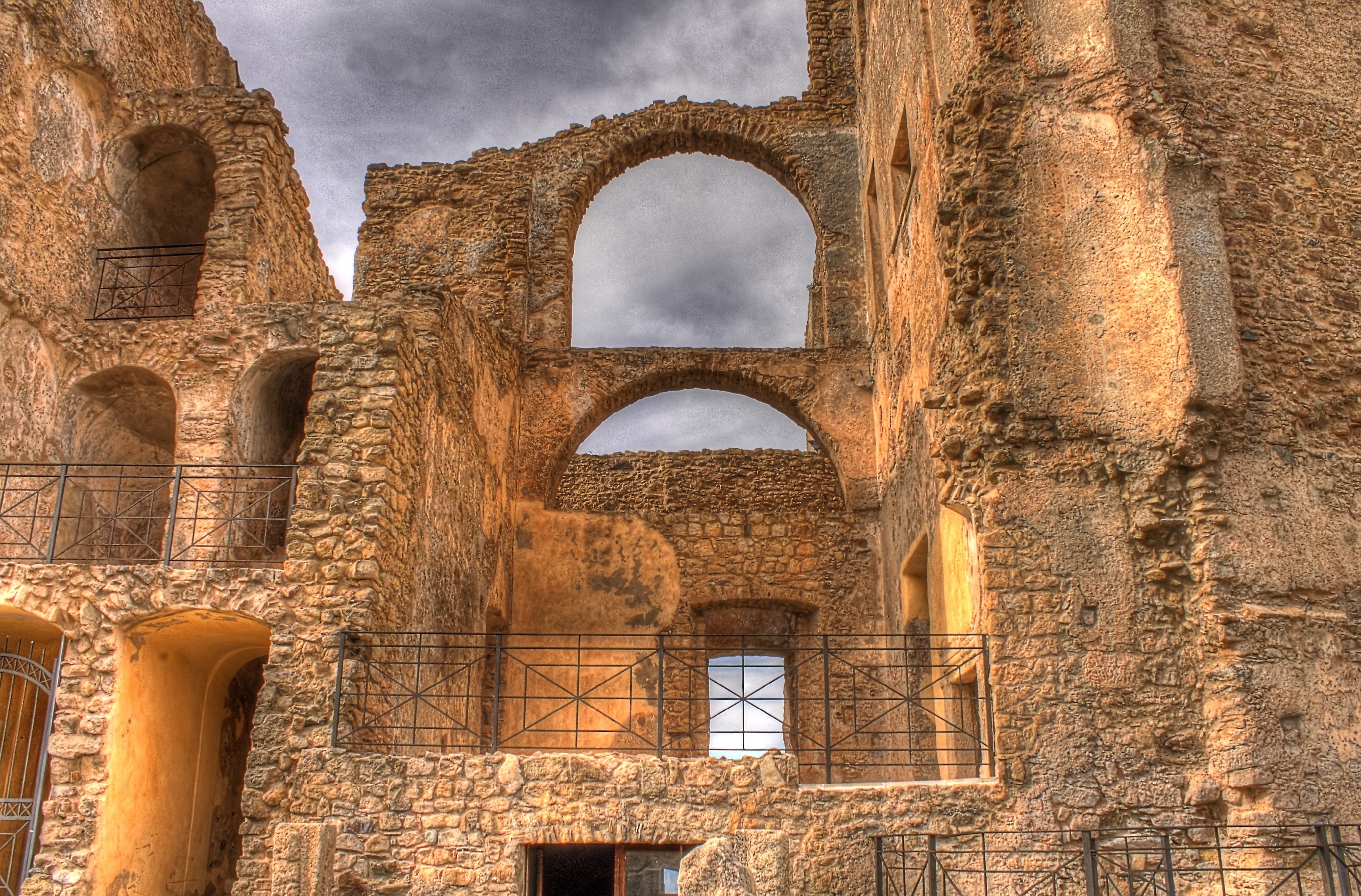 ancient stone ruins with arches
